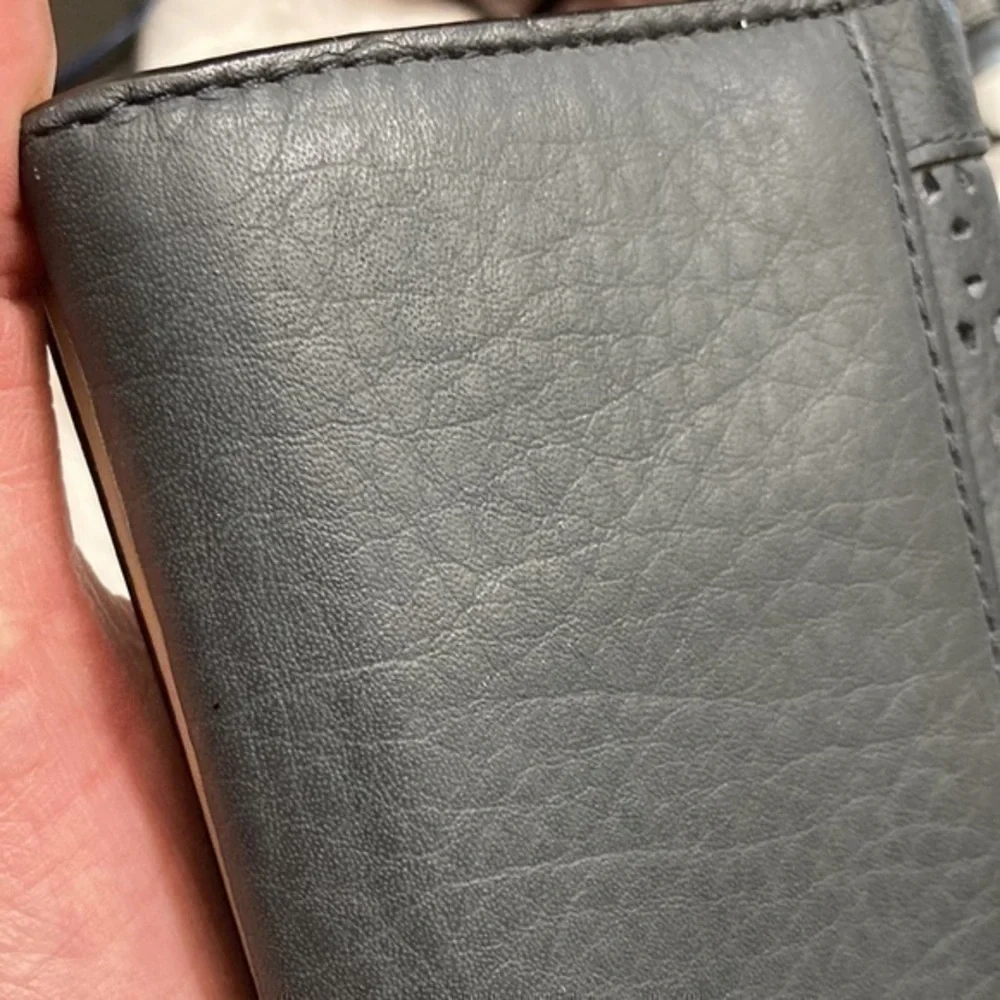 Kate spade black perforated leather wallet wristlet
